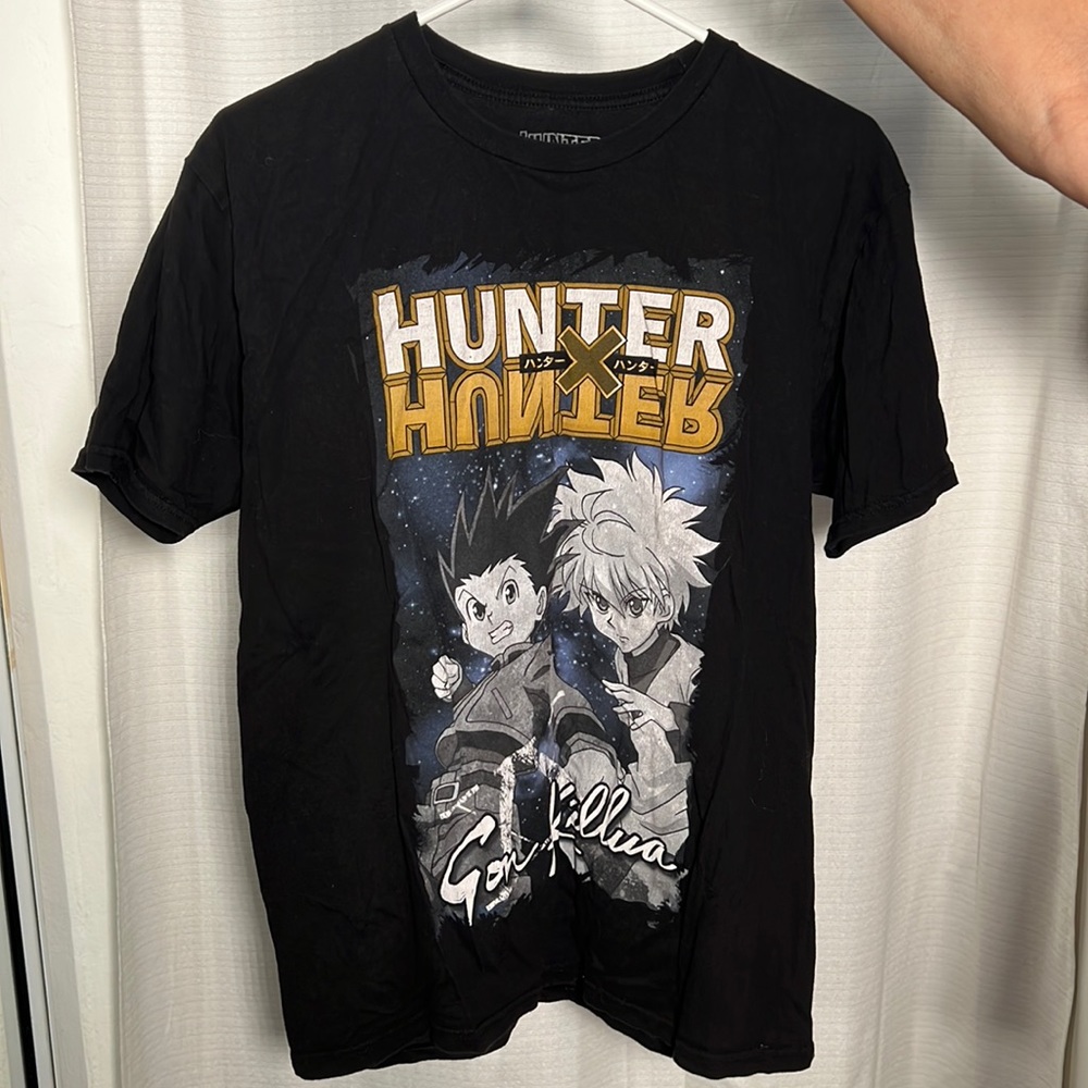 Black shirt. A little oversized. Anime fans will love. Hunter X hunter.
